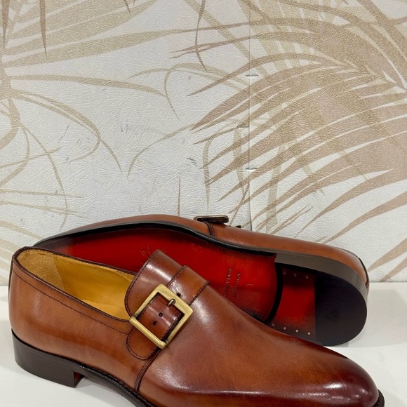 Brown tan single monk strap slip on shoe. 
Made in Italy.
